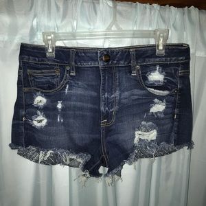 Ripped American Eagle Festival shorts